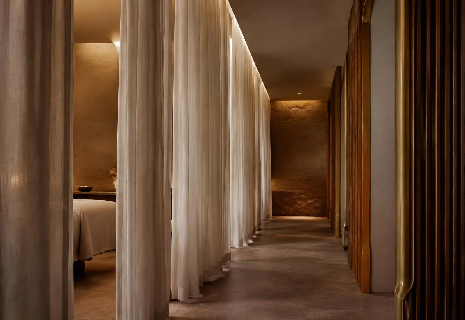 Linen curtains and oak slats in a spa corridor